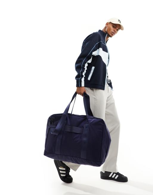 ASOS DESIGN Reisetasche aus Nylon in Marineblau