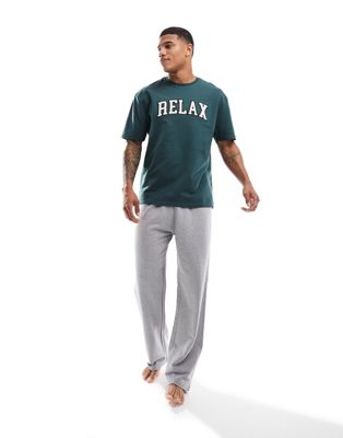 ASOS DESIGN relax slogan pyjama set with texture detail in green