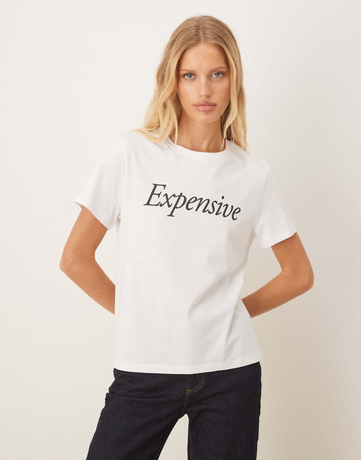 ASOS DESIGN relaxed baby tee with expensive slogan in white