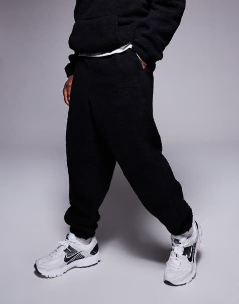 ASOS DESIGN relaxed borg sweatpants in black - view 1