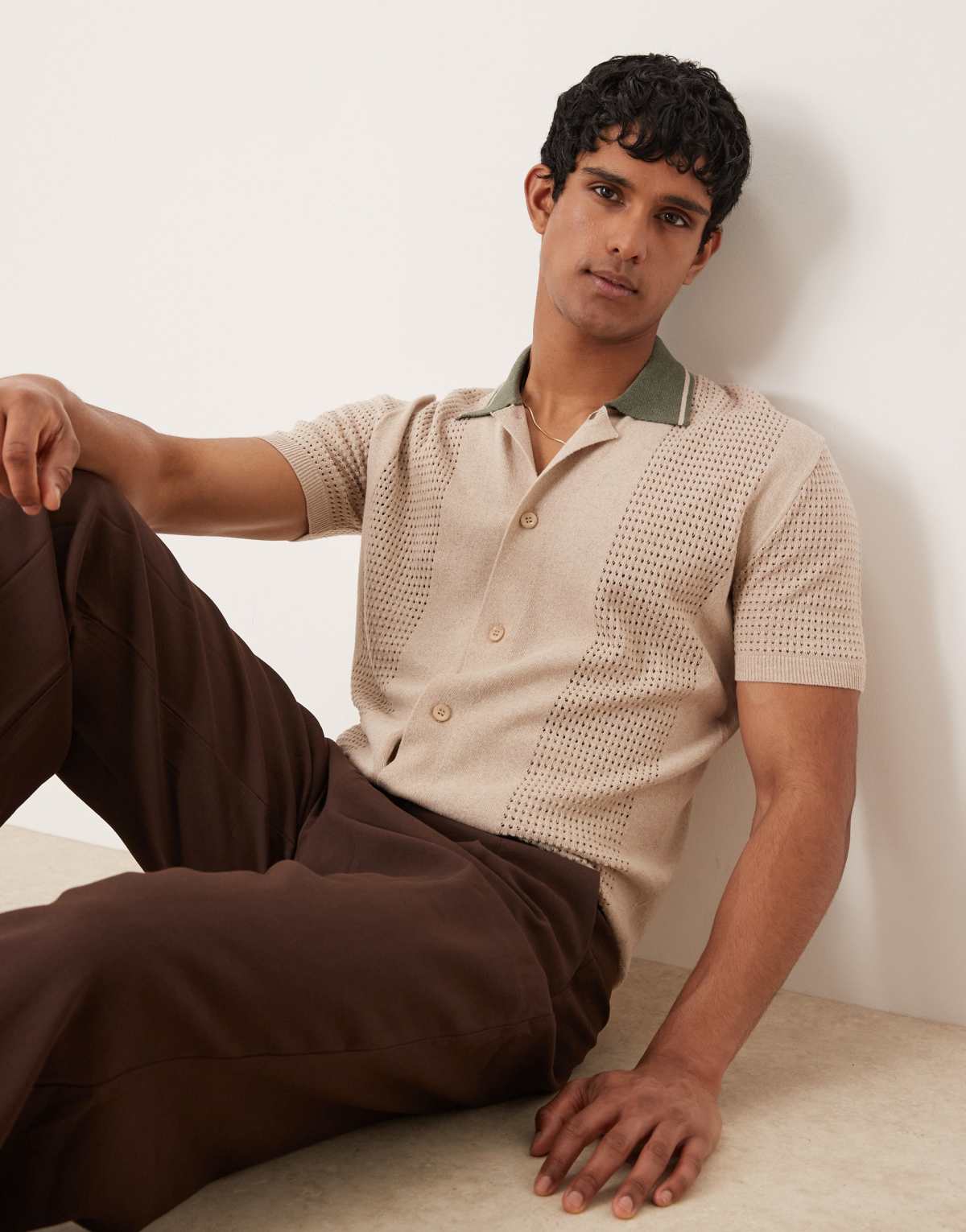 ASOS DESIGN relaxed boxy button through knitted polo with contrast collar in beige