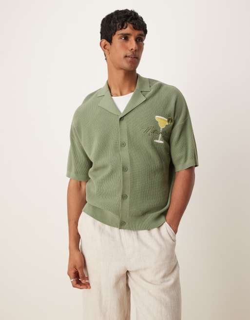 ASOS DESIGN relaxed boxy fit knitted button-through revere polo shirt with margarita embroidery in sage green