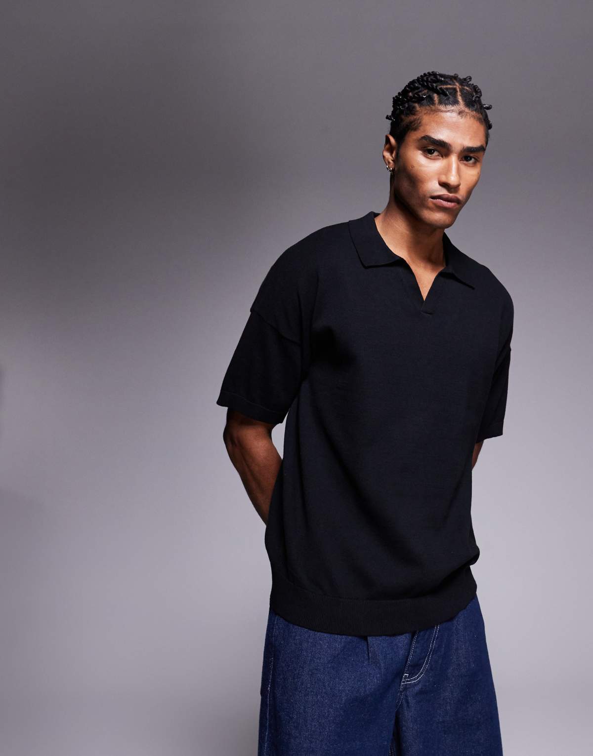 ASOS DESIGN relaxed boxy fit knitted midweight cotton notch neck polo in black