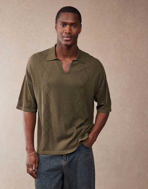 ASOS DESIGN relaxed boxy fit knitted notch neck polo with pointelle pattern in dark green - view 1