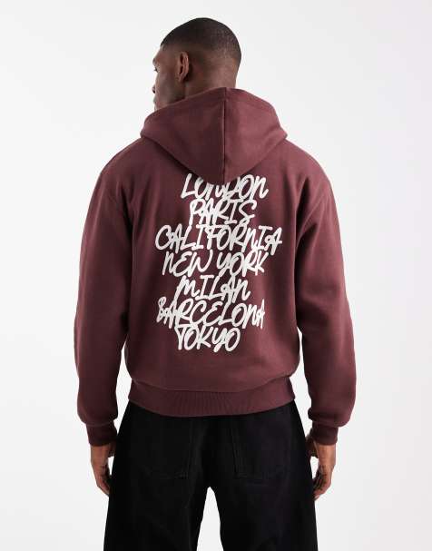 ASOS DESIGN relaxed boxy hoodie with graffiti prints in brown - view 1