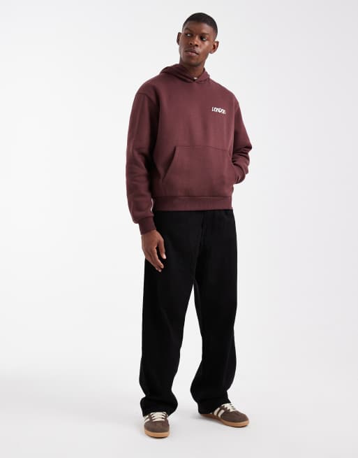 ASOS DESIGN relaxed boxy hoodie with graffiti print in brown