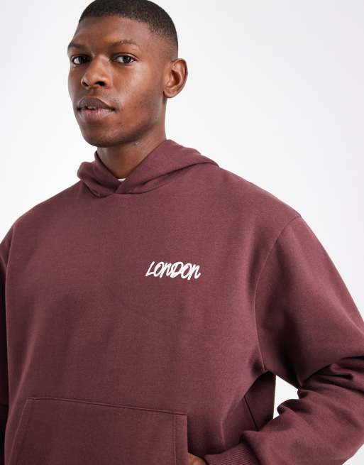 ASOS DESIGN relaxed boxy hoodie with graffiti print in brown