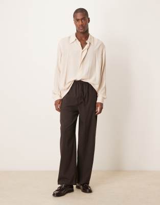 Asos Design Relaxed Boxy Fit Knitted Polo With Chest Pocket And Embroidery Text In White