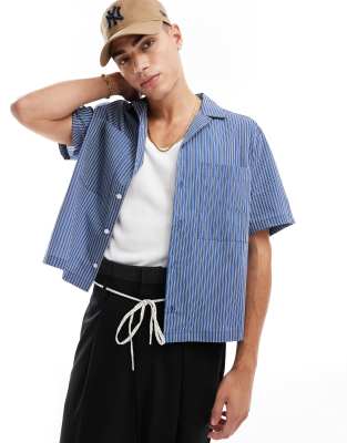 relaxed boxy shirt with front pockets in blue stripe