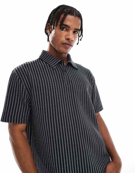 ASOS DESIGN relaxed boxy striped polo in black and white - view 1