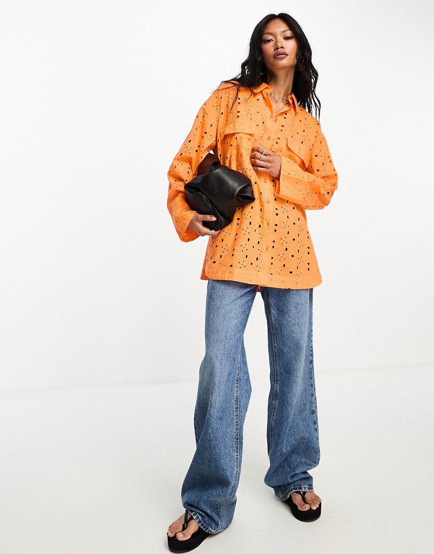 ASOS DESIGN relaxed broderie shirt with dipped hem in orange