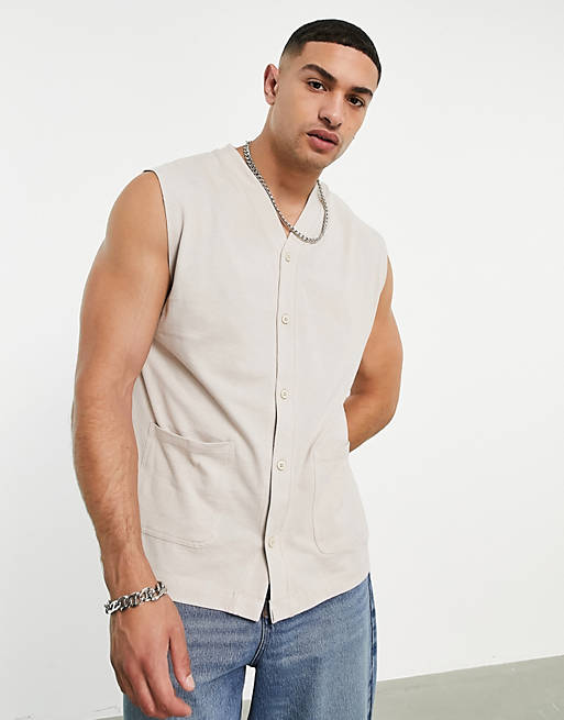 relaxed button through vest with pocket detail in light grey 