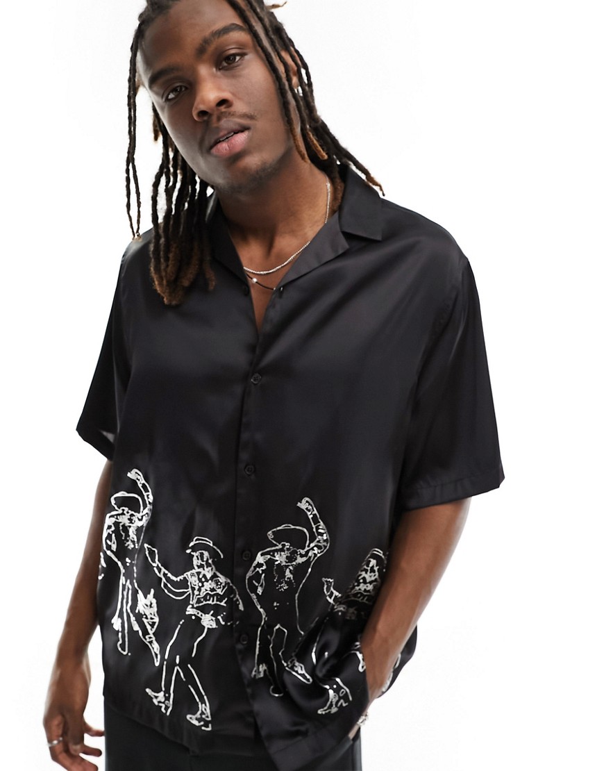 Asos Design Relaxed Camp Collar Satin Shirt In Black With Foil Cowboy Print