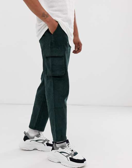 ASOS DESIGN relaxed cargo pants in dark green cord