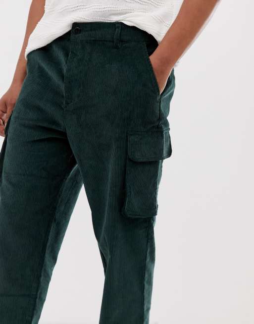 ASOS DESIGN relaxed cargo pants in dark green cord