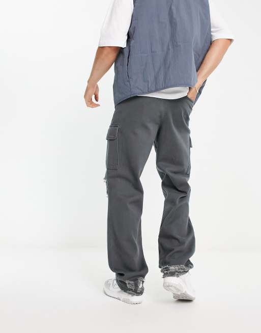 ASOS DESIGN relaxed cargo pants with busted knee