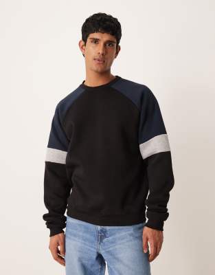 ASOS DESIGN relaxed color block sweatshirt in black | ASOS