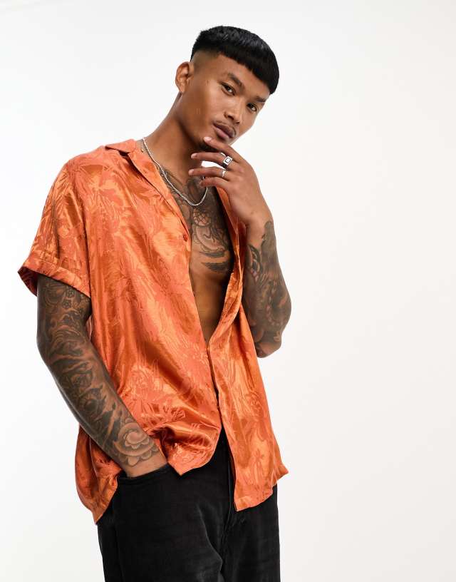 ASOS DESIGN relaxed deep revere shirt in orange leafy print jacquard