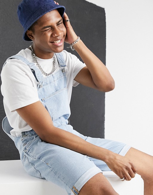 ASOS DESIGN relaxed denim dungaree shorts in light stone wash blue