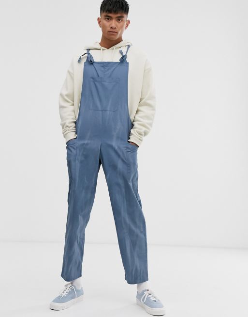 ASOS DESIGN relaxed dungarees in washed blue
