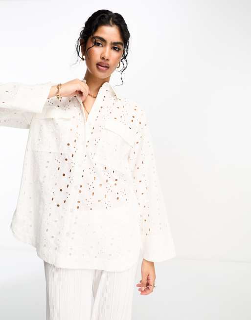 ASOS DESIGN relaxed eyelet shirt with dipped hem in white