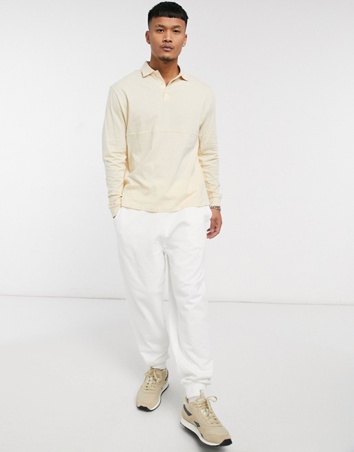 ASOS DESIGN relaxed fit cut and sew polo with rib detail in beige