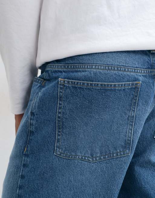 ASOS DESIGN relaxed-fit jeans in middenblauw, 4 van 5