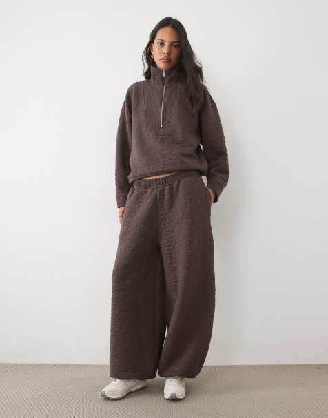 ASOS DESIGN relaxed fit jogger in textured jacquard set in brown - view 1