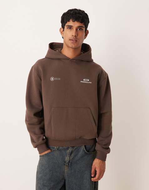 ASOS DESIGN – Relaxed-Fit-Kapuzenpullover in Braun mit Logoprint - view 1