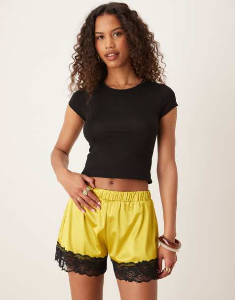 ASOS DESIGN relaxed fit lace trim stretch satin shorts in lime with black lace - view 1