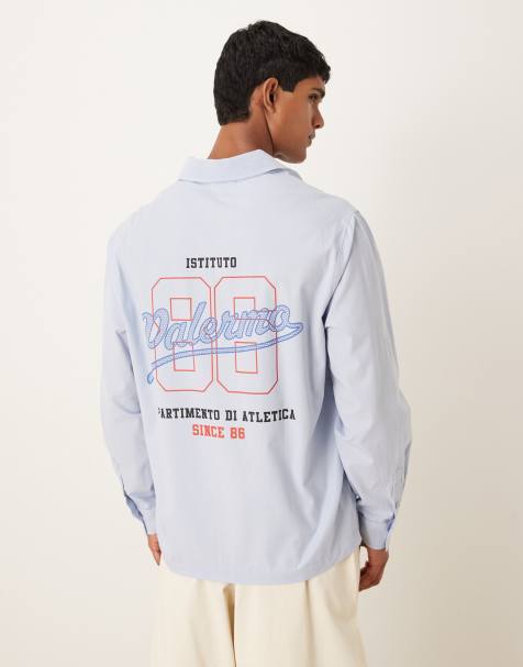 ASOS DESIGN relaxed fit long sleeved shirt with print detail in blue poplin - view 1
