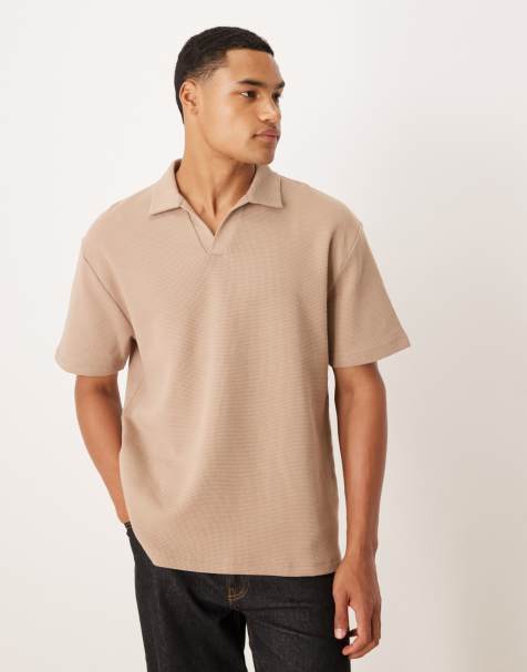 ASOS DESIGN – Relaxed-Fit-Polohemd in Beige mit Reverskragen und Waffelstruktur - view 1