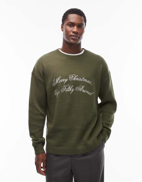 ASOS DESIGN – Relaxed Fit Strickpullover in Grün mit „Merry Christmas Ya Filthy Animal“-Slogan - view 1