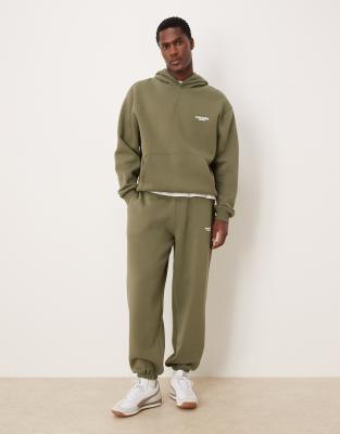 Asos Design Relaxed Fit Sweatpants With Print In Green