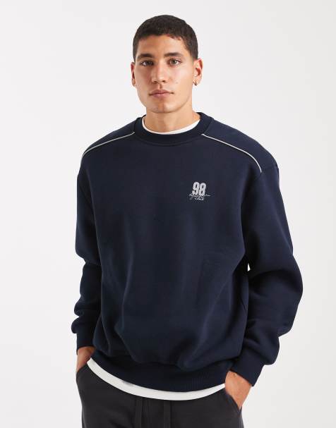 ASOS DESIGN – Relaxed-Fit-Sweatshirt in Marineblau mit Paspelierung und Sportnummern-Grafik - view 1