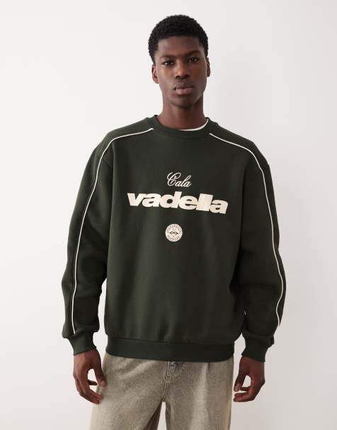 ASOS DESIGN relaxed fit sweatshirt with piping and print in dark green - view 1