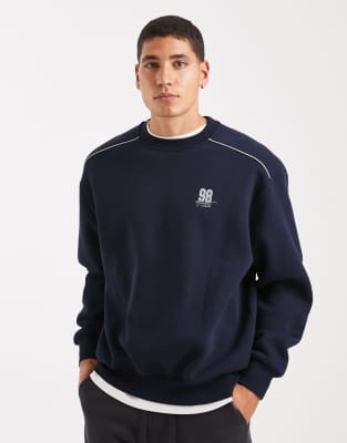 ASOS DESIGN relaxed fit sweatshirt with piping and sports number