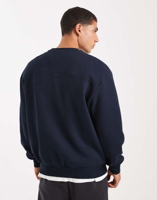 ASOS DESIGN relaxed fit sweatshirt with piping and sports number graphic in navy, 3 of 5