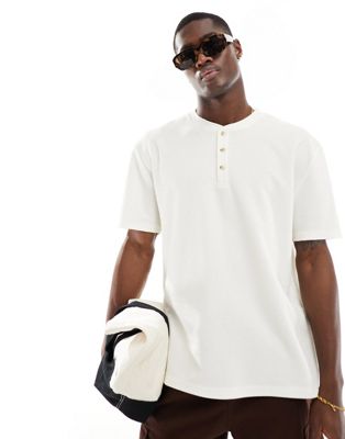 ASOS DESIGN relaxed fit t-shirt with button up collar in cream