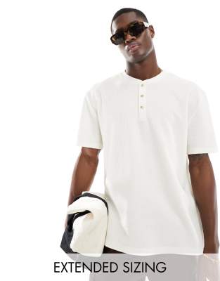 ASOS DESIGN relaxed fit t-shirt with button up collar in cream-White