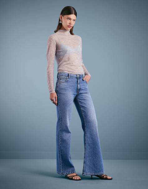 ASOS DESIGN relaxed flare jean in mid blue - view 1