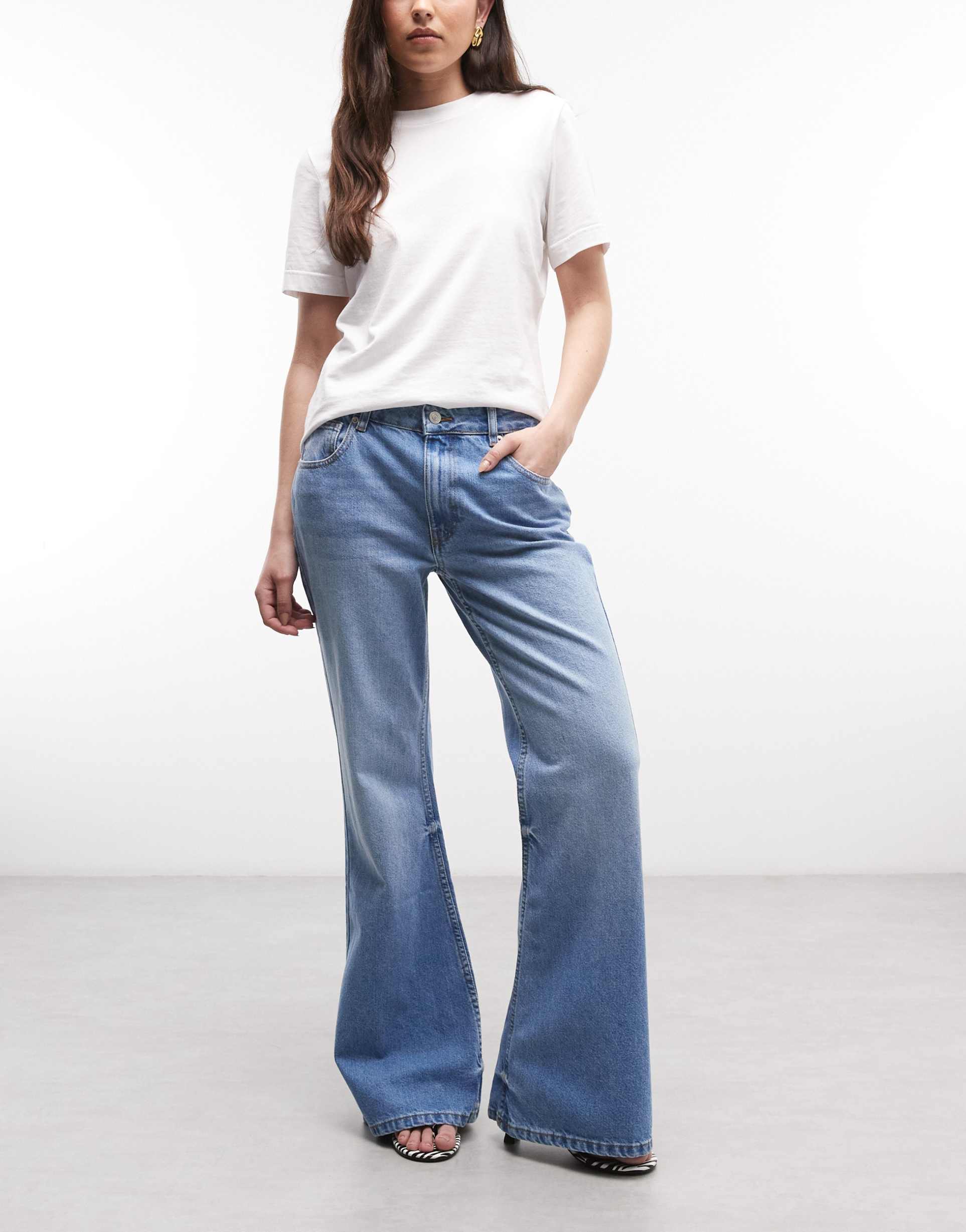 asos design relaxed flare jeans in light midwash