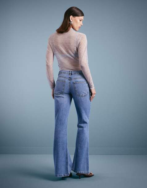 ASOS DESIGN relaxed flare jeans in mid blue - view 1