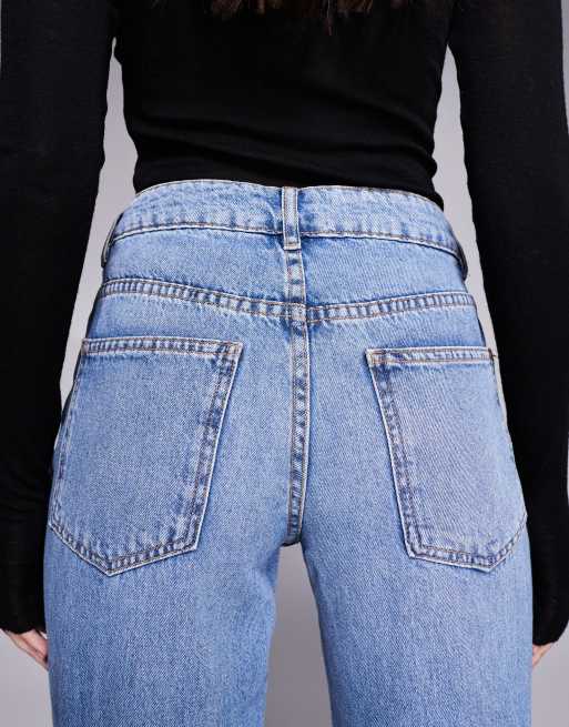 ASOS DESIGN relaxed flare jeans in mid blue, 4 of 5