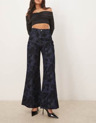Asos Design Relaxed Flare Jeans With Paisley Flock In Blue