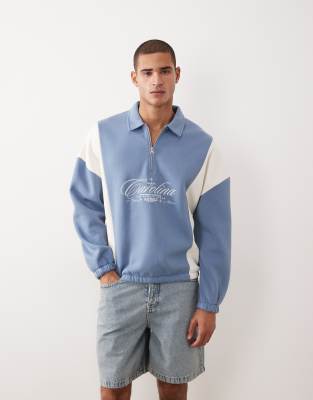 Непринужденная толстовка ASOS DESIGN на молнии до половины длины, с вставками из кройки и шитья и вышитым принтом синего цвета winward blue