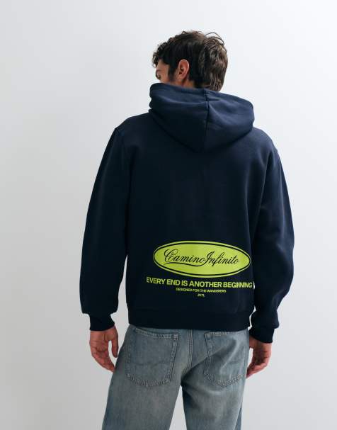 ASOS DESIGN relaxed hoodie with black print in navy - view 1