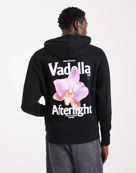 ASOS DESIGN relaxed hoodie with photographic floral print in black - view 1