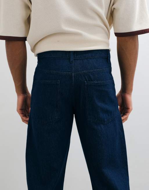 ASOS DESIGN relaxed jeans in mid wash blue with vintage wash & abrasions, 4 of 5
