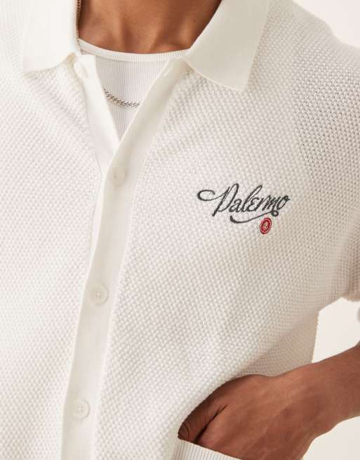 ASOS DESIGN relaxed knit button down polo shirt with chest embroidery in ecru